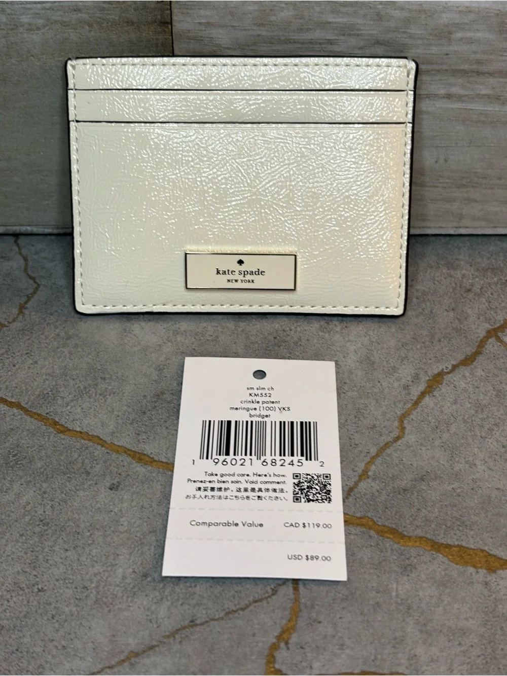 kate spade NWT Cream Leather Card Holder with Gold Plaque